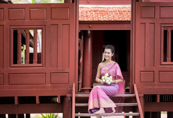 Beautiful Thai girl in Thai traditional costume