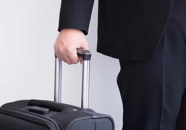 Male's hand hold baggage for travelling — Stock Photo, Image
