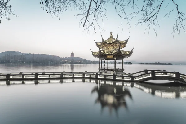 Beautiful hangzhou in sunset and ancient pavilion — Stock Photo, Image