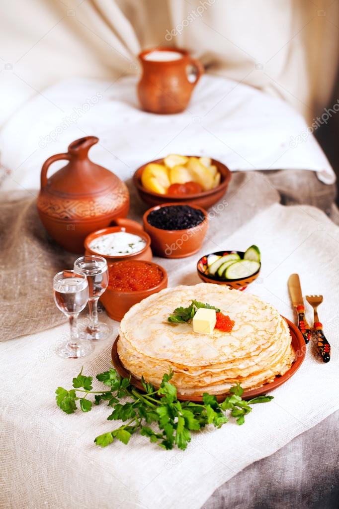 stack pancakes with red caviar and parsley butter rural rustic still life pottery canvas village