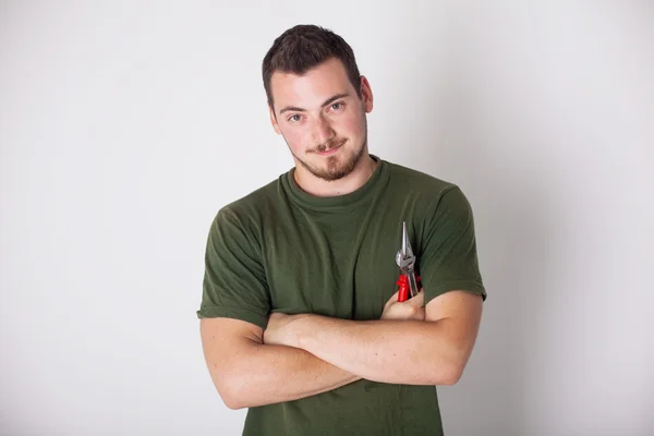 Man with pliers — Stock Photo, Image