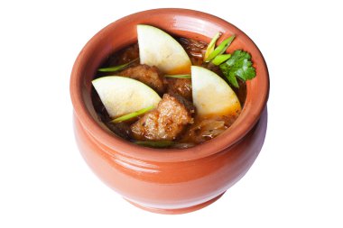 elma menüsünün bir kil tencerede et