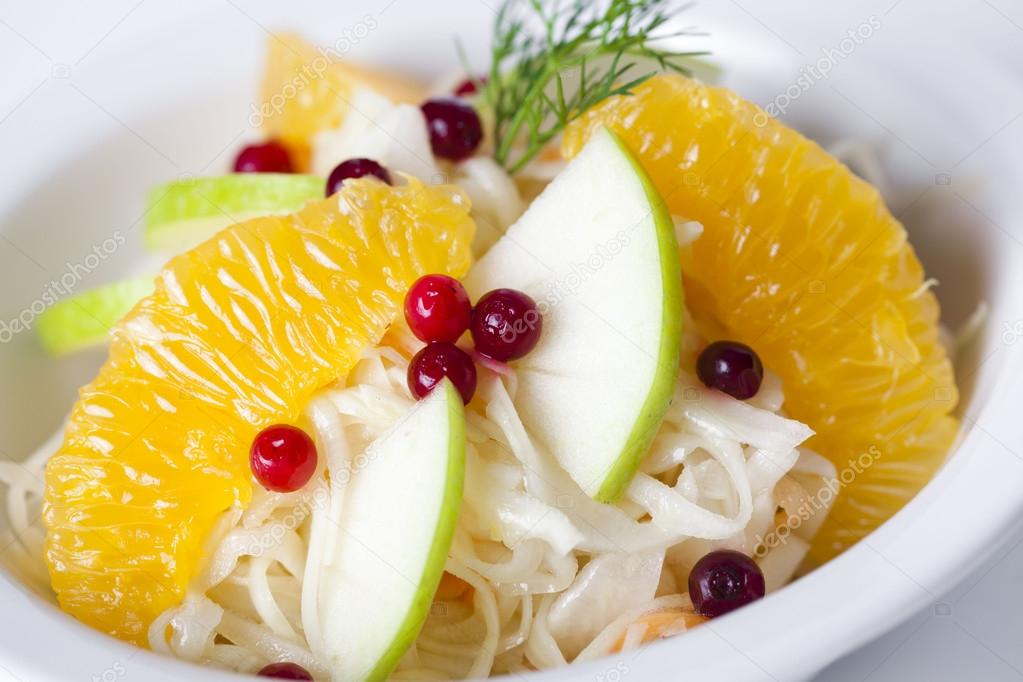 cabbage salad with apples, oranges and cranberries