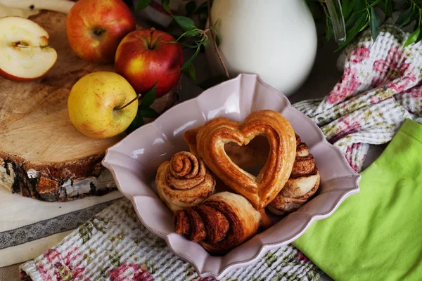 Buns and cakes heart rose in a still life, village, Provence, love of baking — Stock Photo, Image