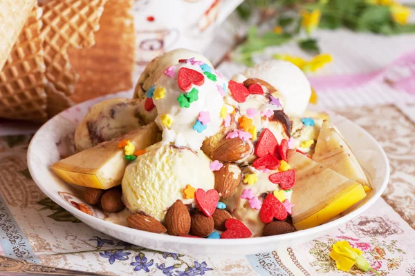 Ice cream bowl with sprinkles banana, almonds, love, heart, happiness, many, waffle — Stock Photo, Image
