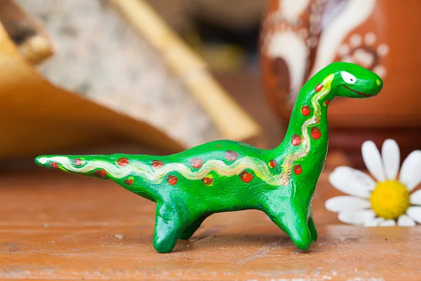 Clay ceramic toy dinosaur still life beautiful cute kids long neck — Stock Photo, Image