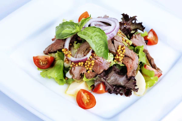 Salad with boiled pork, cherry tomatoes, mustard grains — Stock Photo, Image