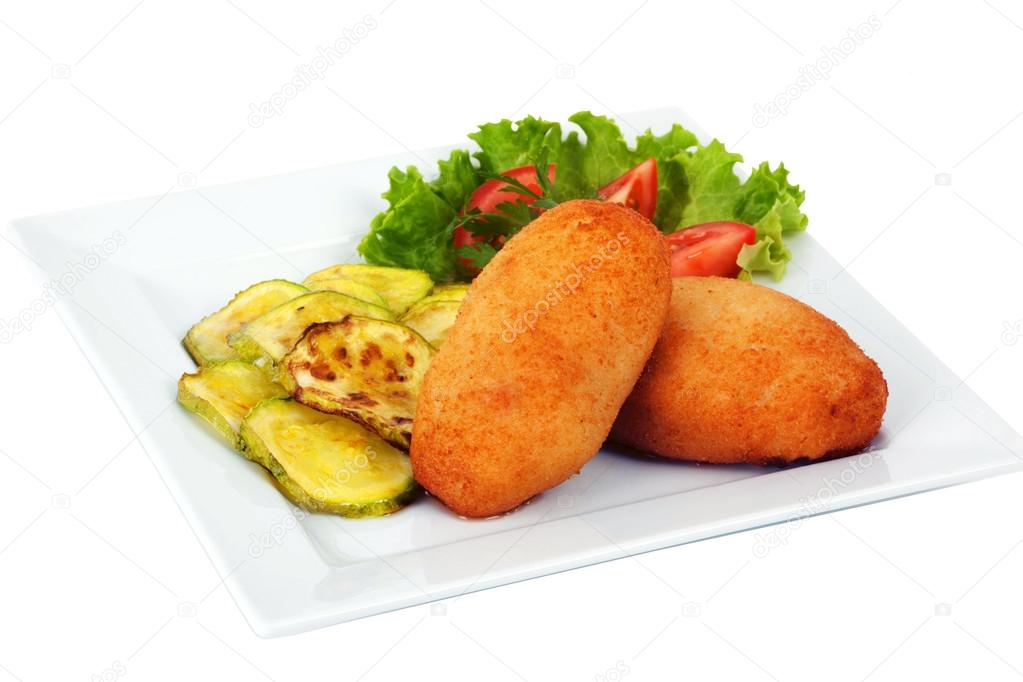 cutlet with zucchini, tomato and lettuce