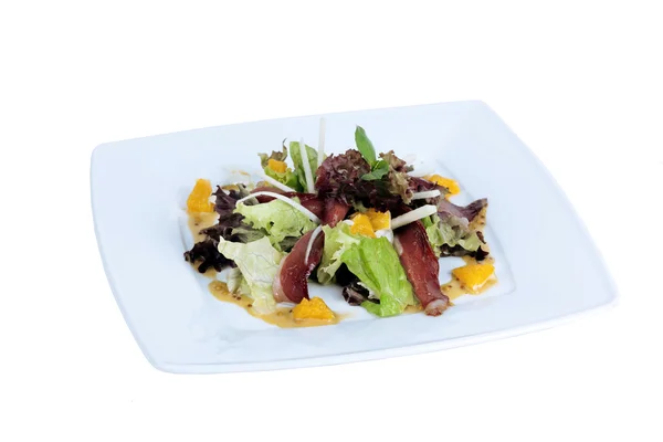 Jerked beef, salad, lettuce, orange on the plate — Stock Photo, Image