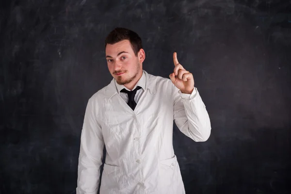 Mens in een witte jurk Stockfoto