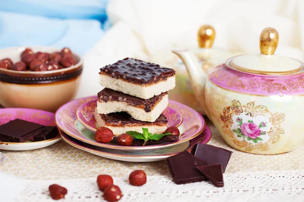 Three pieces of shortcake cake with nuts and chocolate — Stock Photo, Image