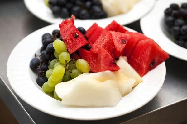 Fruit plate of watermelon melon grapes — Stock Photo, Image