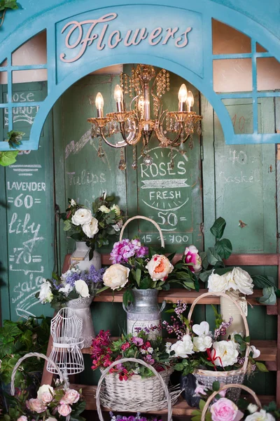 Flower shop, peonies, roses, artificial flowers — Stock Photo, Image