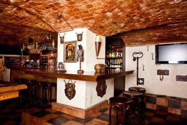 Medieval interior restaurant bar armor stone brick vaults