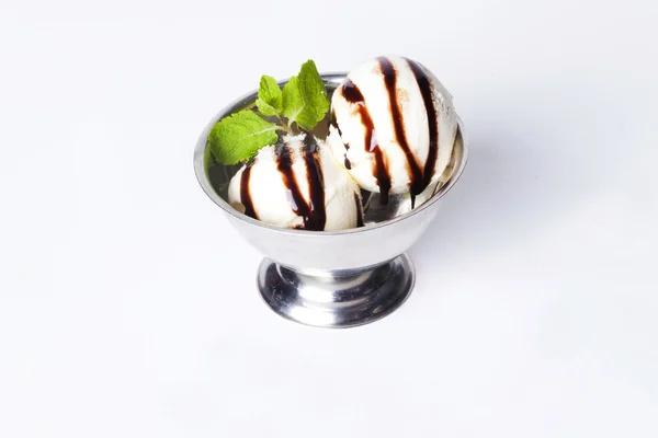 Vanilla ice-cream balls with chocolate sauce and mint metal bowl on a white background isolated for cafe restaurant menu — Stock Photo, Image