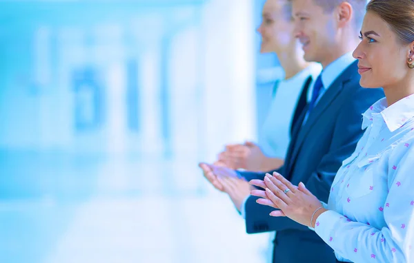 Smiling business people applauding a good presentation in the office — Stock Photo, Image
