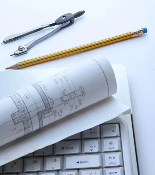 Architecture blueprint and tools on the desk