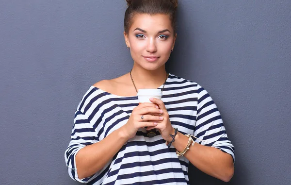 Portrait of  young woman with cup  tea or coffee — Stock Photo, Image