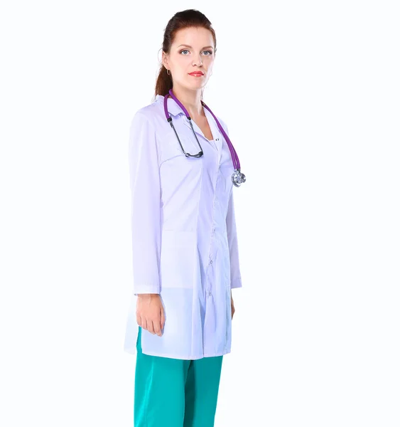 Smiling female doctor  in uniform standing at hospital — Stock Photo, Image