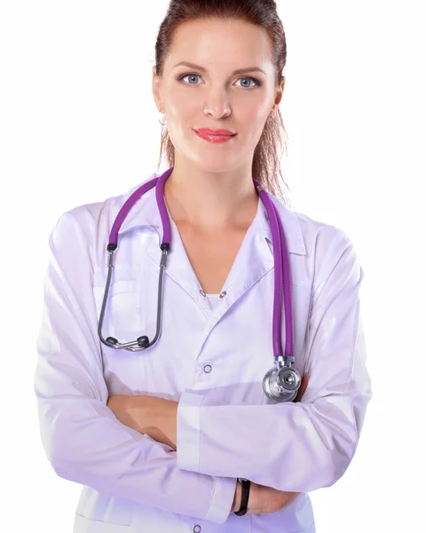 Portrait of young woman doctor with white coat standing in hospital — Stock Photo, Image