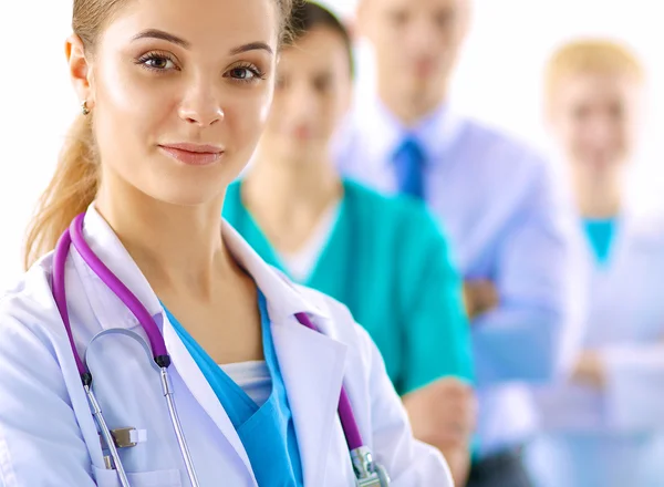 Woman doctor standing with stethoscope at hospital — Stock Photo, Image