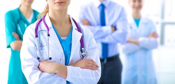 Woman doctor standing with stethoscope at hospital — Stock Photo, Image