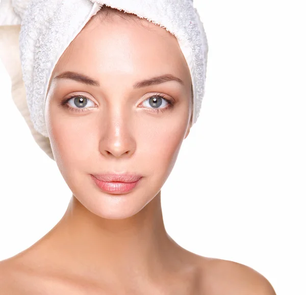 Beautiful woman with a towel on her head — Stock Photo, Image