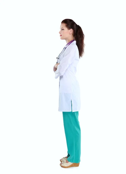 Smiling female doctor  in uniform standing at hospital — Stock Photo, Image