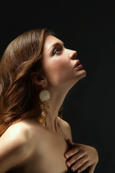 Portrait of beautiful young woman . Isolated on dark background — Stock Photo, Image