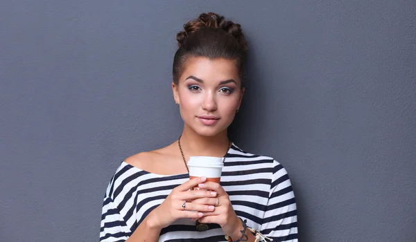 Portrait of  young woman with cup  tea or coffee — Stock Photo, Image