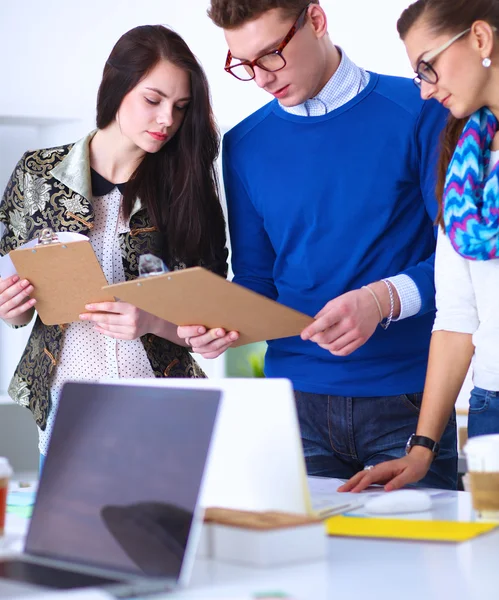 Young business people working at office on new project — Stock Photo, Image