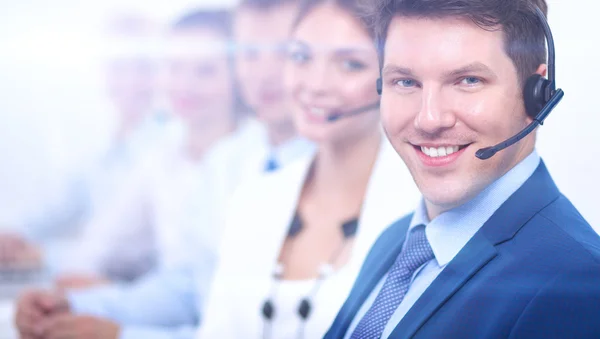 Attractive Smiling positive young businesspeople and colleagues in a call center office — Stock Photo, Image