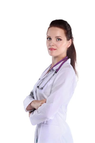 하얀 코트를 입고 병원에 서 있는 젊은 여자 의사의 모습 — 스톡 사진