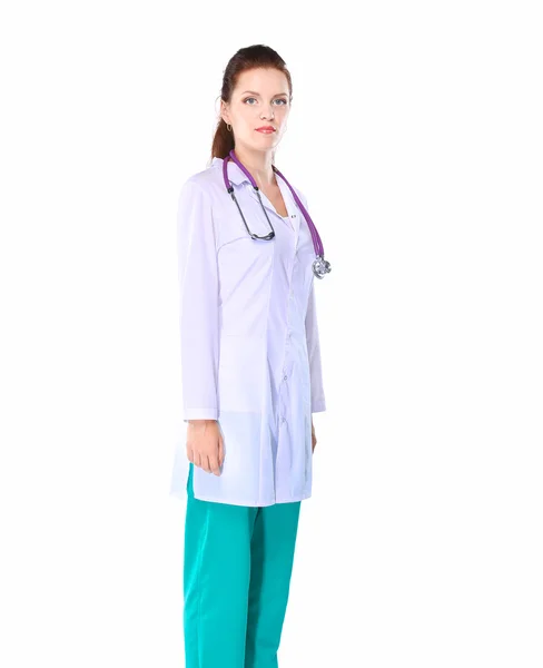 Smiling female doctor  in uniform standing at hospital — Stock Photo, Image