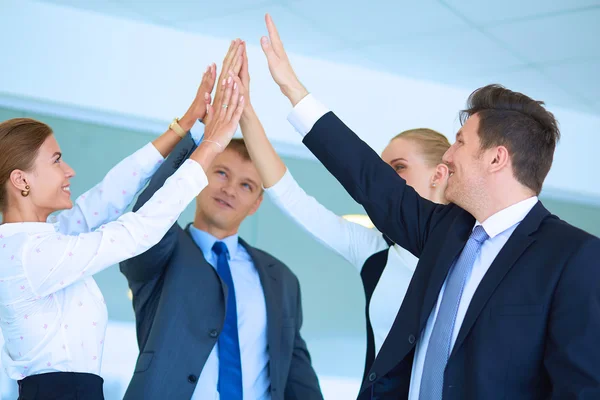 Business people with their hands together in a circle — Stock Photo, Image