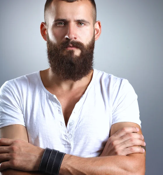 Portrait of handsome man standing, isolated on grey background — Stock Photo, Image