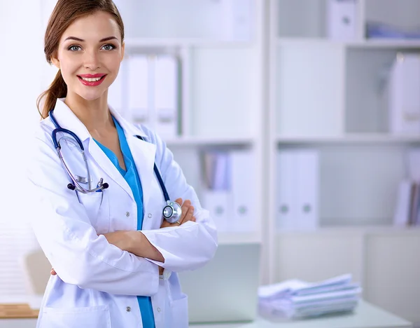 Medical team sitting at the table in modern hospital — Stock Photo, Image