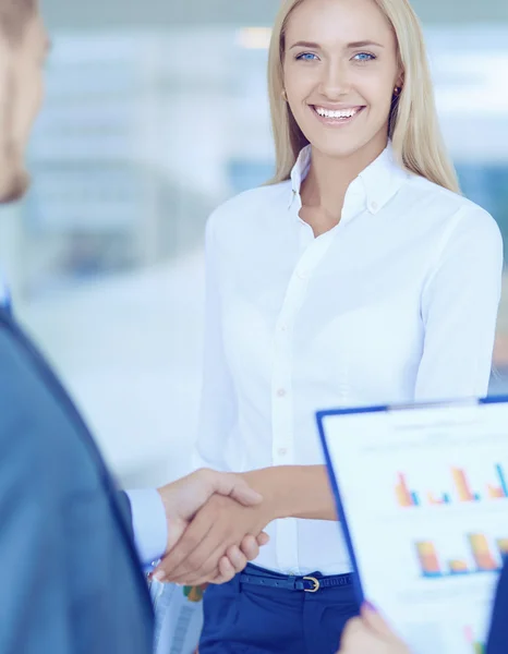 Two successful business people shaking hands with each other — Stock Photo, Image