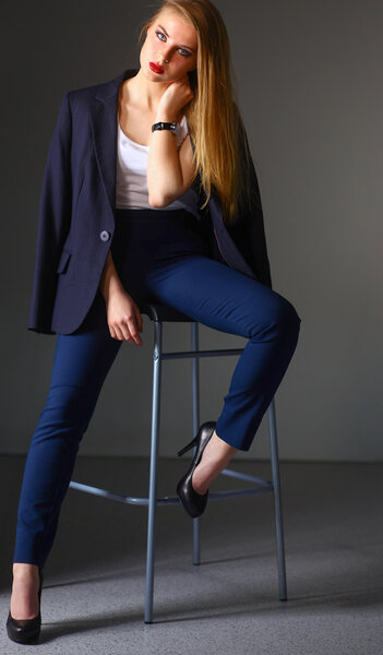 Young woman sitting on a chair