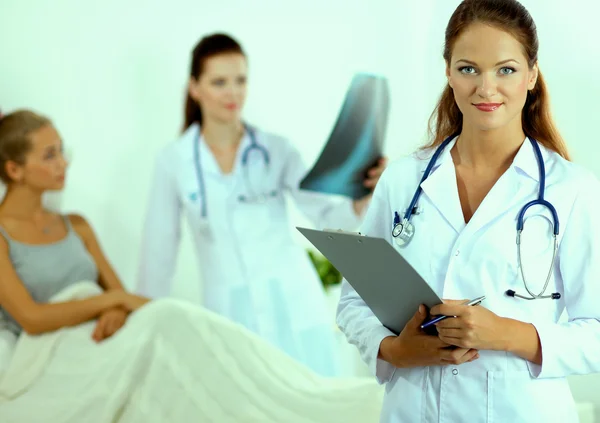 Two young woman doctor , standing in hospital — Stock Photo, Image