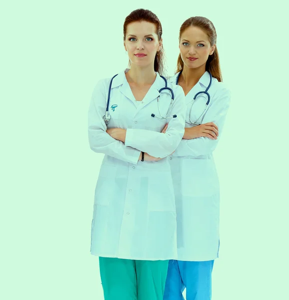 Two woman nurse watching X Ray image, standing in hospital — Stock Photo, Image