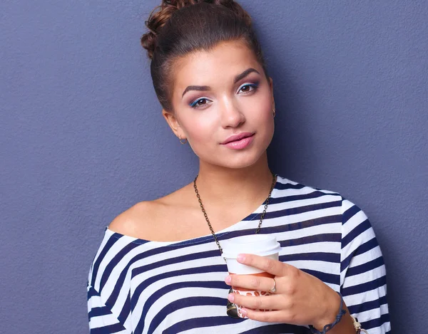 Portrait of  young woman with cup  tea or coffee — Stock Photo, Image