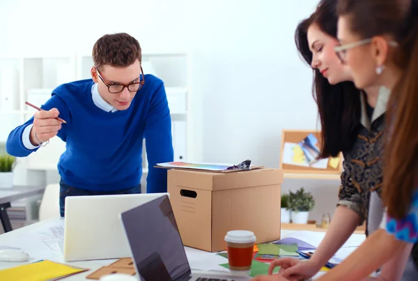 Young business people working at office on new project — Stock Photo, Image