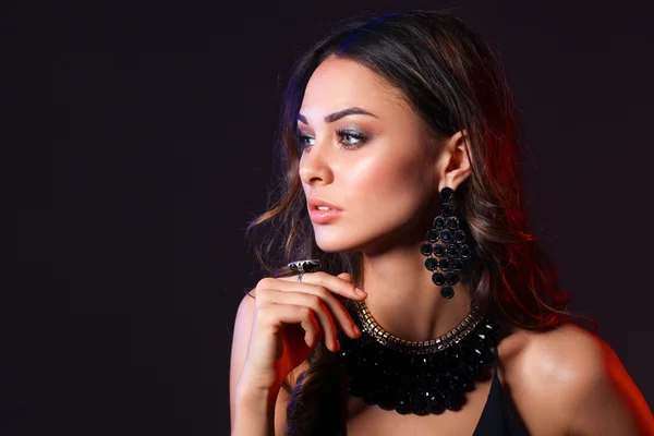 Portrait of a beautiful woman with necklace — Stock Photo, Image