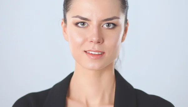 Portrait of a beautiful young business woman thinking against — Stock Photo, Image