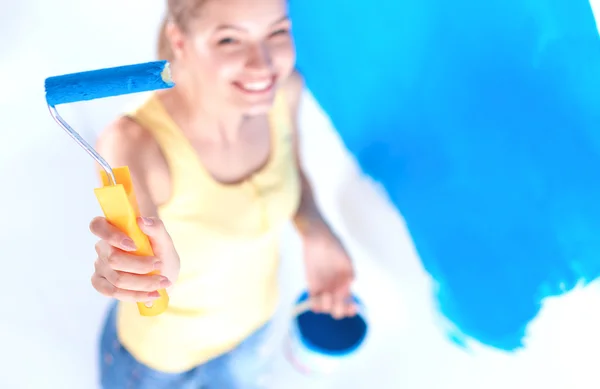Happy beautiful young woman doing wall painting — Stock Photo, Image