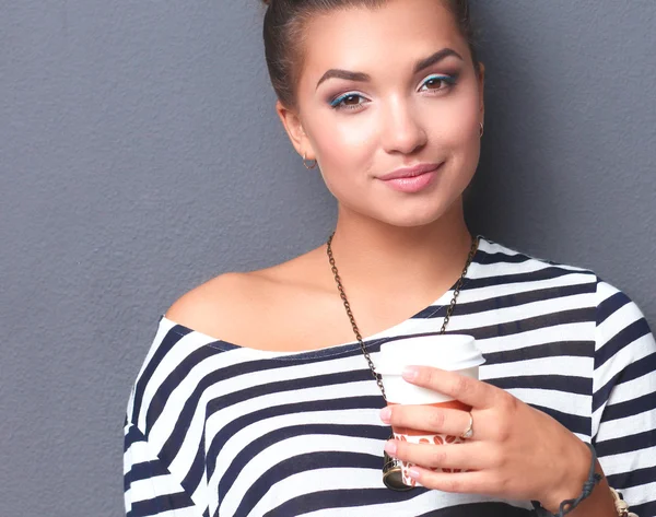 Portrait of young woman with cup tea or coffee — Stock Photo, Image