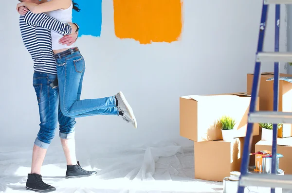 Happy young couple moving in new house — Stock Photo, Image