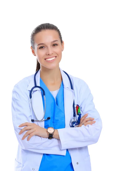 Woman doctor with stethoscope standing with arms crossed isolated on a white background — Stock Photo, Image