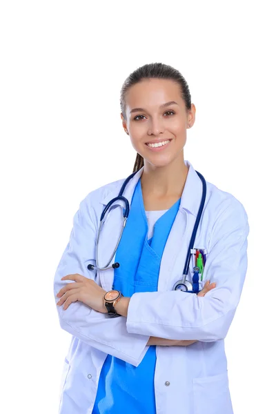 Woman doctor with stethoscope standing with arms crossed isolated on a white background — Stock Photo, Image